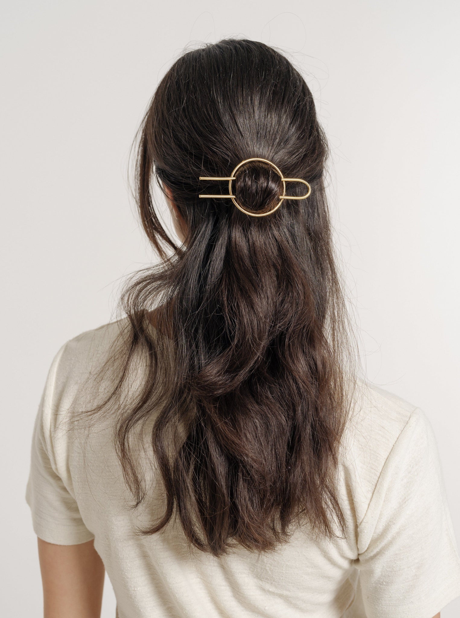 The back view of a woman wearing a Classic Hair Pin.