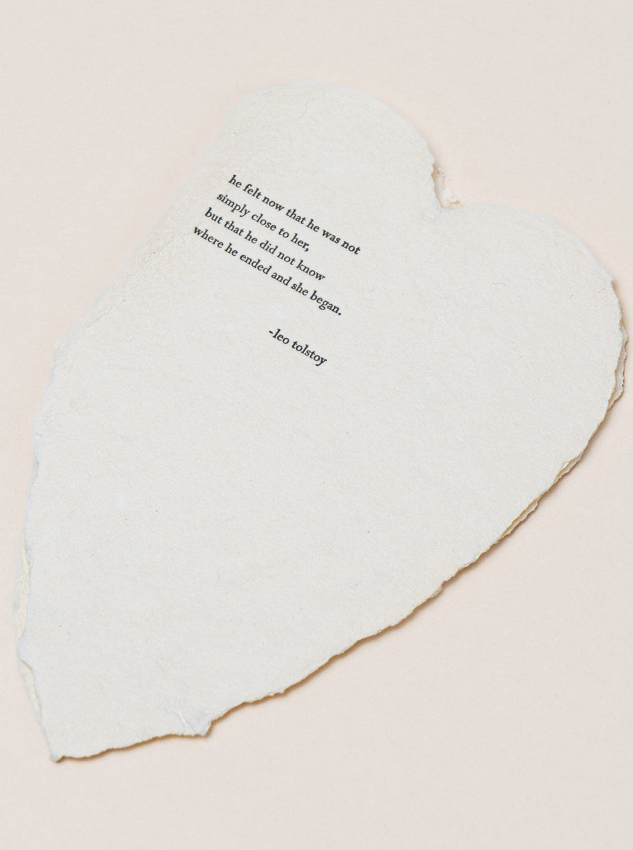 A Leo Tolstoy Card with a heart shaped piece of cream paper, letterpress printed with a poem.