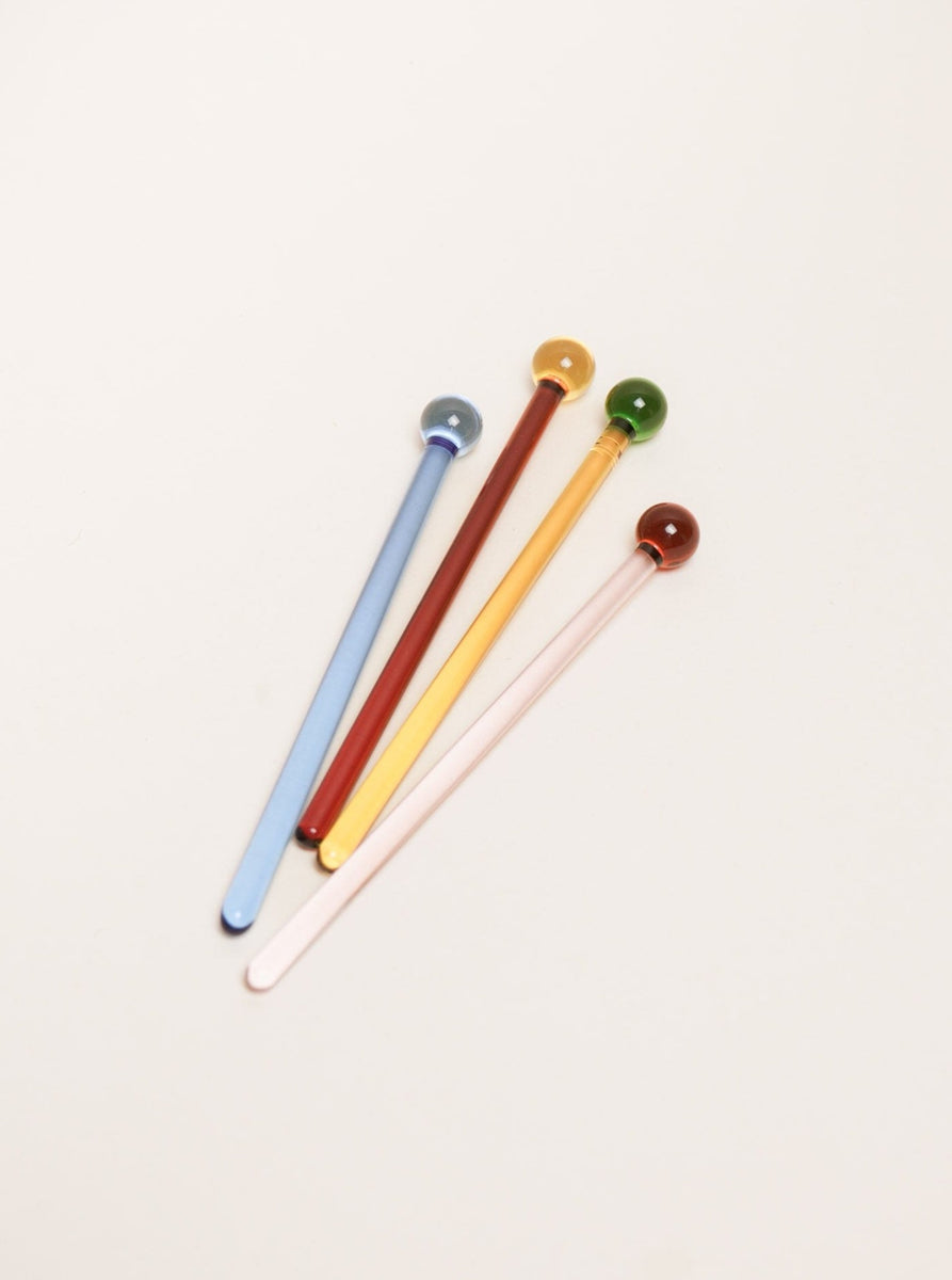 A Cocktail Stirrer Set on a white surface.
