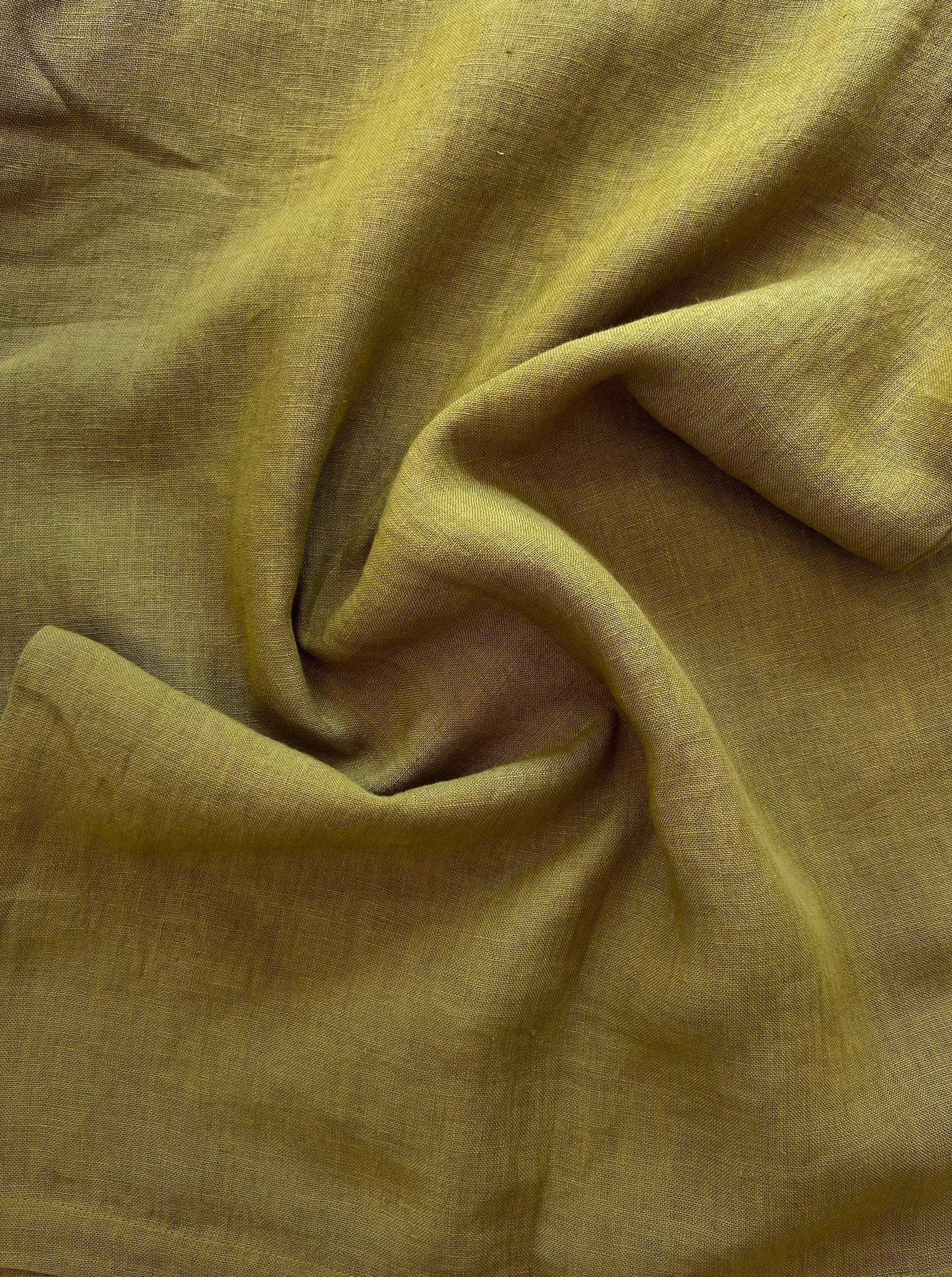 A close up image of Everyday Crop - Dried Tobacco linen fabric.