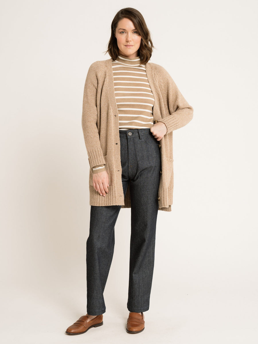 The fit sample model is wearing a Sample 144 - Mock Neck Long Sleeve Tee - Tannin Stripe and jeans.