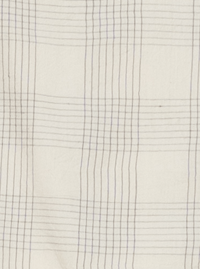 A close up of an Everyday Crop Pant - Rivera Plaid.