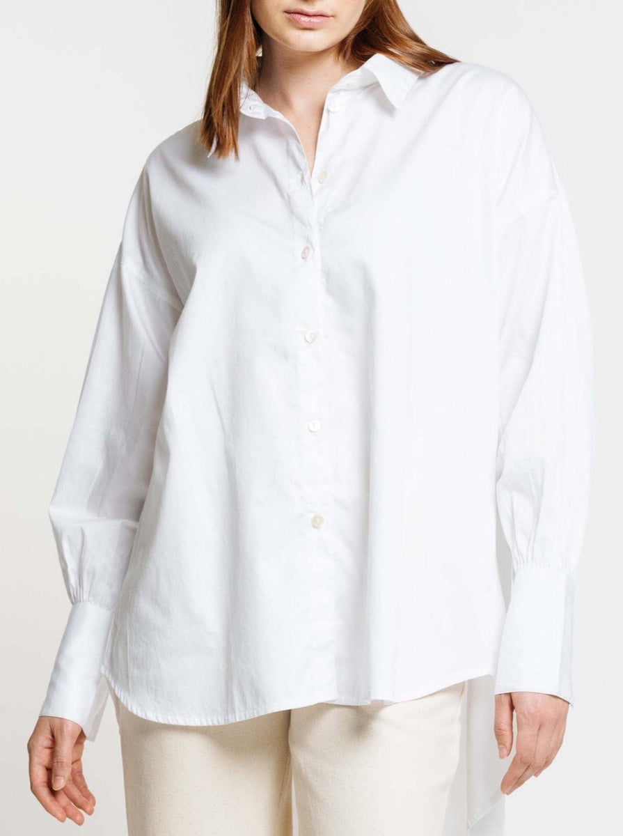 A woman wearing the Museo Button Up - White shirt.